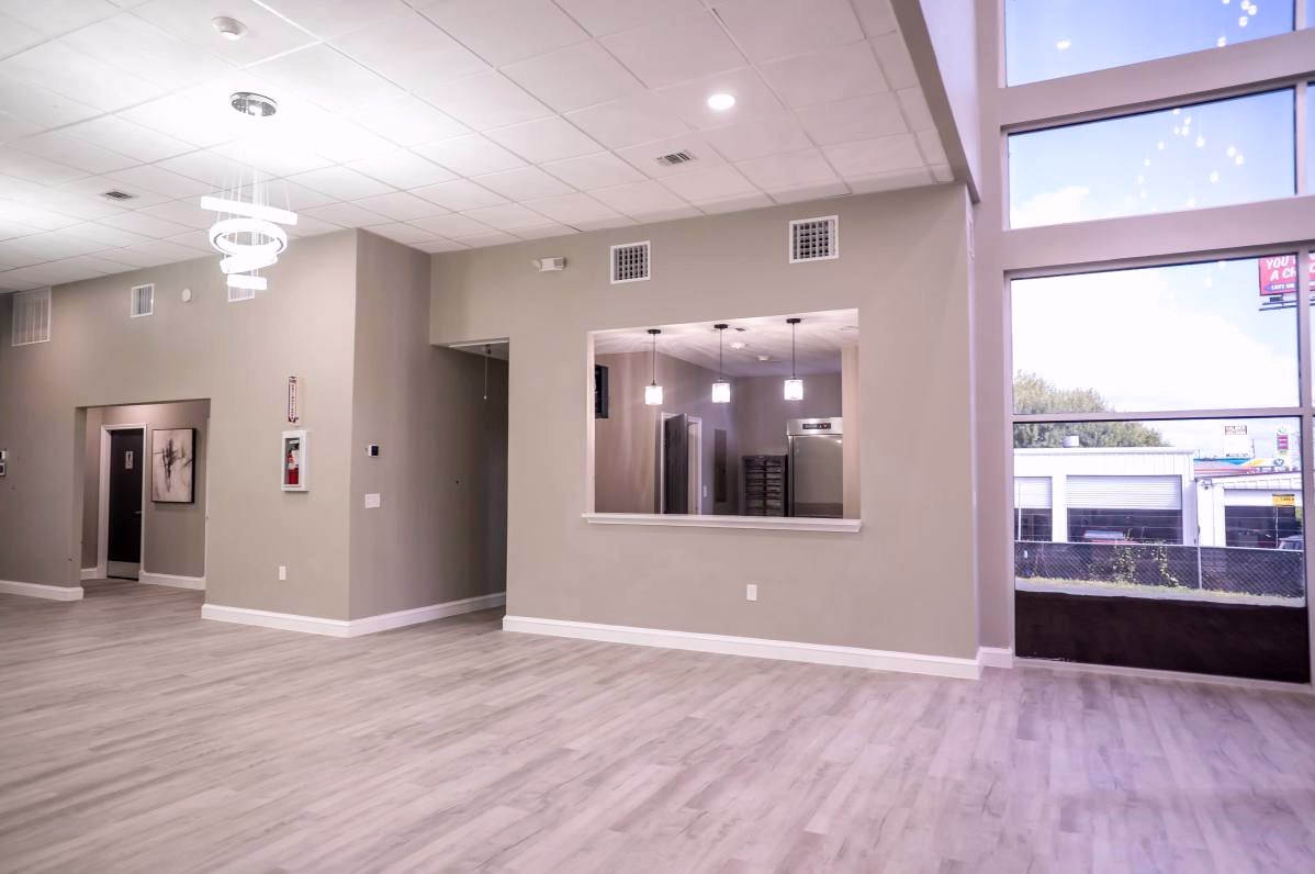 Onyx Event Center — open floor plan showing catering pass-through and natural light